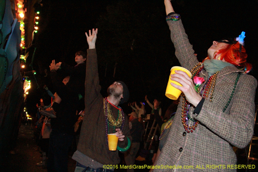 Revelers cheer for throws during the Krewe of Cleopatra parade - photo by Jules Richard