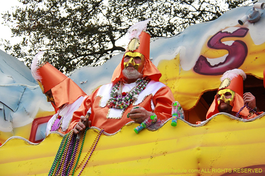 Float riders in the Krewe of Carrollton, Mardi Gras New Orleans - photo by Jules Richard